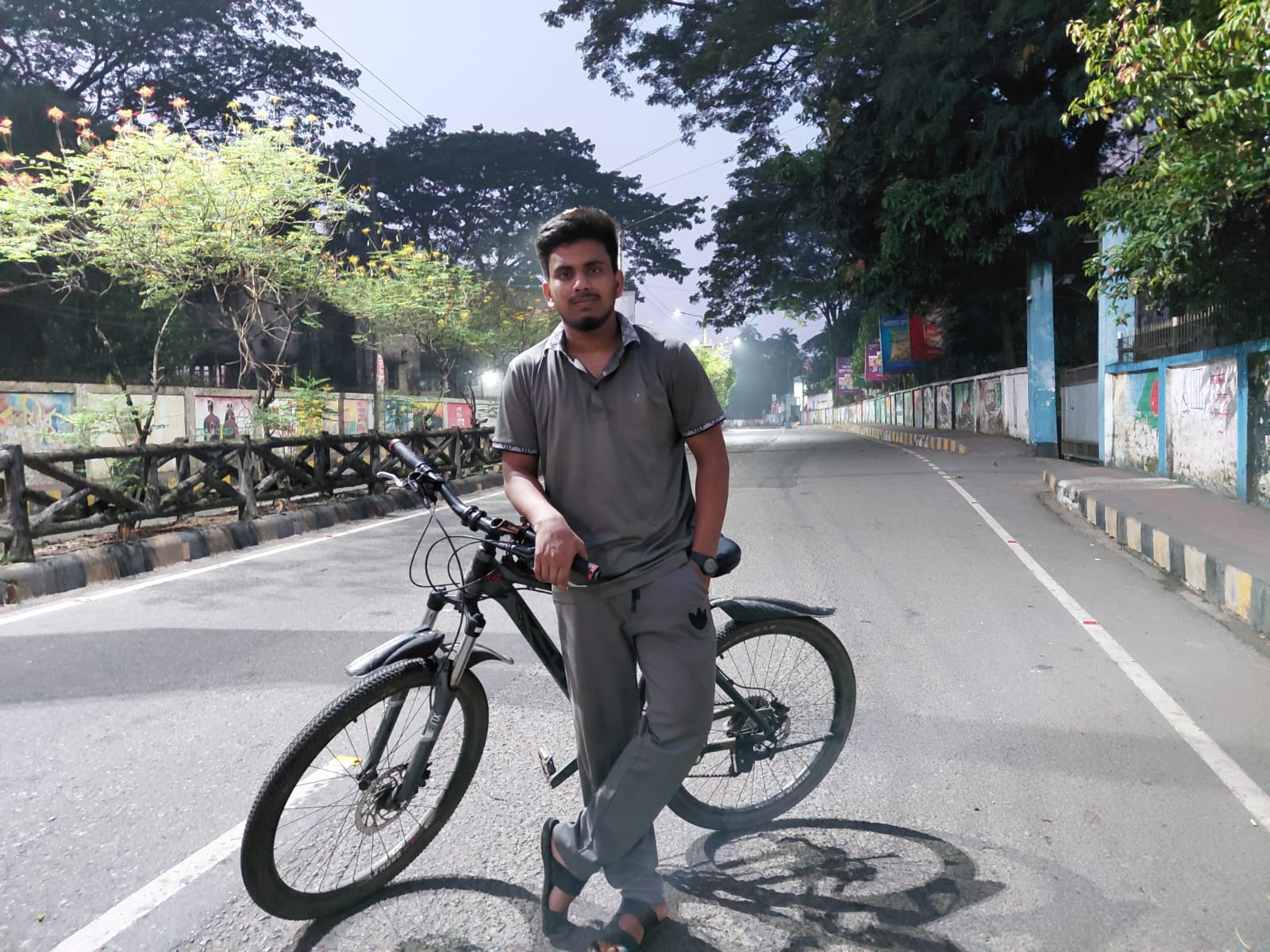Parvej Ahmed Himel Biking on a Quiet Road